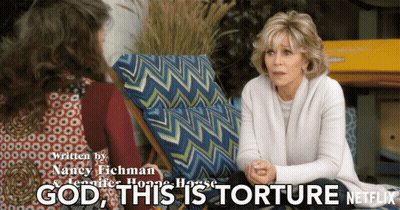 A Poster For God This Is Torture Shows Two Women Sitting In Chairs GIF