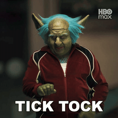 A Poster For Hbo Max Shows A Troll With Blue Hair And A Red Jacket GIF