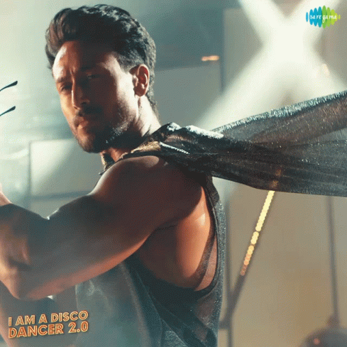 A Poster For I Am A Disco Dancer 2.0 With A Man Dancing GIF