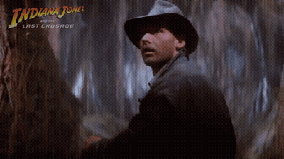 A Poster For Indiana Jones And The Last Crusade Features A Man In A Hat GIF