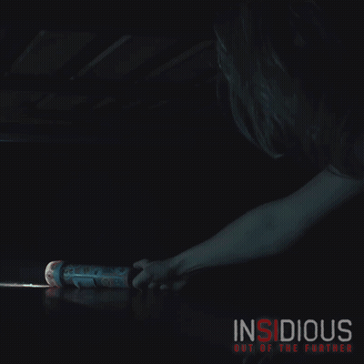 A Poster For Insidious Out Of The Further Shows A Person Looking Under A Bed GIF