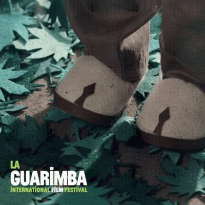 A Poster For La Guarimba International Film Festival Shows A Pair Of Shoes GIF