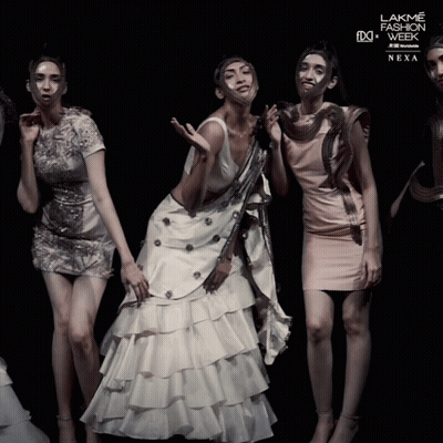 A Poster For Lakme Fashion Week Shows A Group Of Women GIF