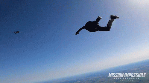 A Poster For Mission Impossible Shows A Man Jumping Through The Air GIF