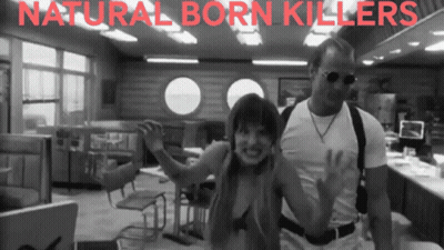 A Poster For Natural Born Killers Features A Man And Woman GIF