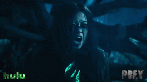A Poster For Prey Shows A Woman With Her Mouth Open GIF