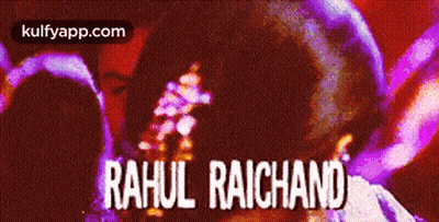 A Poster For Rahul Raichand Shows A Man In A Dark Room GIF