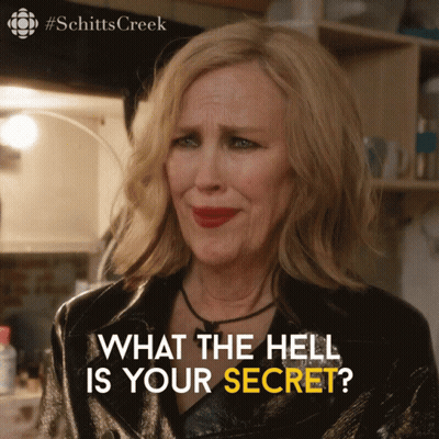 A Poster For Schitts Creek Shows A Woman With Red Lipstick GIF