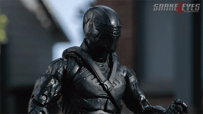 A Poster For Snake Eyes Shows A Soldier In A Black Suit GIF