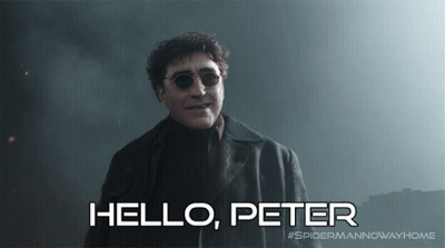 A Poster For Spider Man No Way Home Shows A Man Wearing Sunglasses GIF