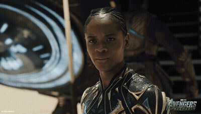 A Poster For The Avengers Documentary Shows A Woman In A Costume GIF