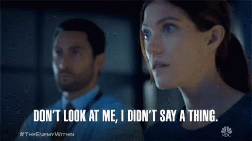 A Poster For The Enemy Within Shows A Man And Woman Looking At Something GIF