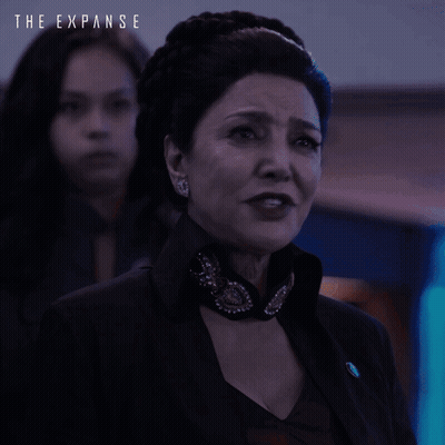 A Poster For The Expanse Shows A Woman Crying And Says Just Get To The Fucking Point GIF