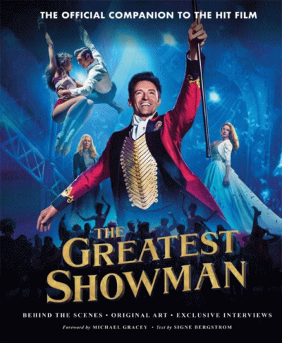 A Poster For The Greatest Showman Shows A Man In A Red Suit Holding A Cane GIF