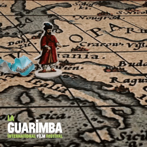 A Poster For The Guarimba International Film Festival With A Map In The Background GIF