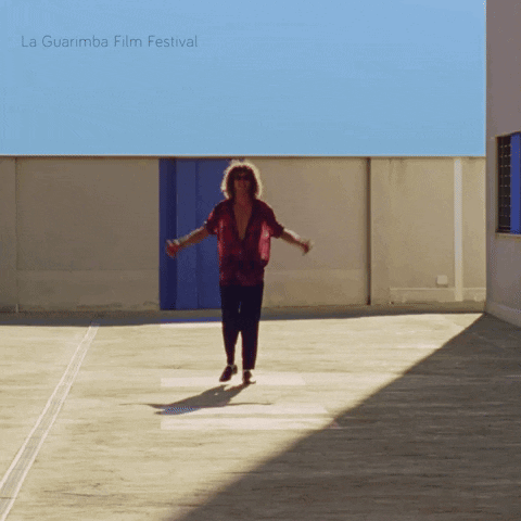 La Guarimba Film Festival Poster Man In Red Shirt GIF