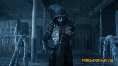 A Poster For The Mortal Kombat Movie Shows Two People Fighting GIF