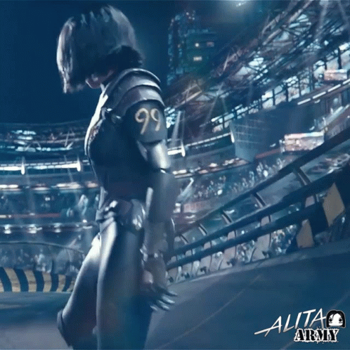 A Poster For The Movie Alita Army Shows A Woman In Armor GIF