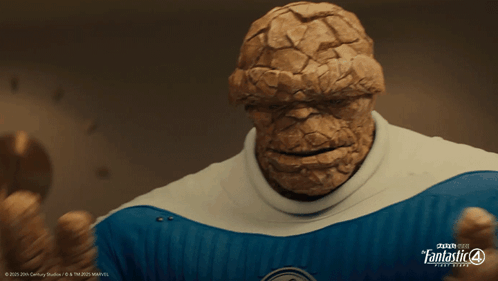 A Poster For The Movie Fantastic Four Shows The Thing Giving A Thumbs Up GIF