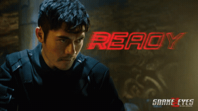 A Poster For The Movie Snake Eyes Shows A Man GIF