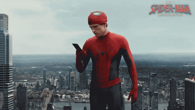A Poster For The Movie Spider-Man Shows A Man In A Suit Looking At His Phone GIF