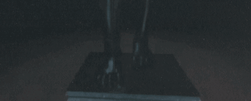 A Poster For The Movie The Mummy Shows A Statue Of A Man GIF