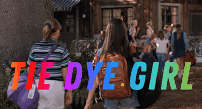 A Poster For The Movie Tie Dye Girl Shows A Group Of Girls Walking In Front Of A House GIF