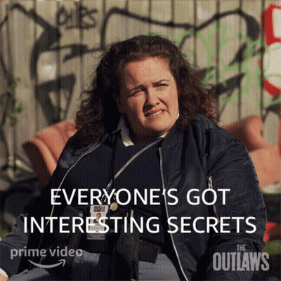 A Poster For The Outlaws Shows A Woman Sitting In Front Of A Graffiti Covered Wall GIF