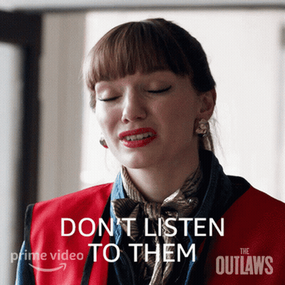 A Poster For The Outlaws Shows A Woman With Her Eyes Closed GIF