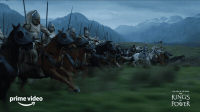 A Poster For The Rings Of Power Shows A Large Army Of Men On Horseback GIF