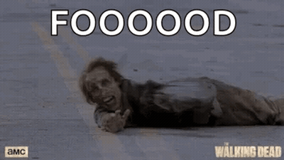 A Poster For The Walking Dead Shows A Zombie Laying On The Ground .. GIF