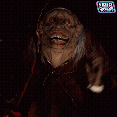 A Poster For Video Horror Society Shows A Scary Witch GIF