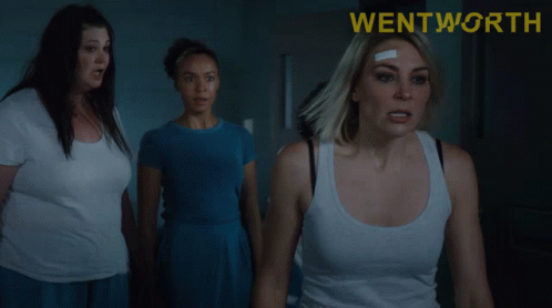 A Poster For Wentworth Shows A Woman With A Bandage On Her Forehead GIF