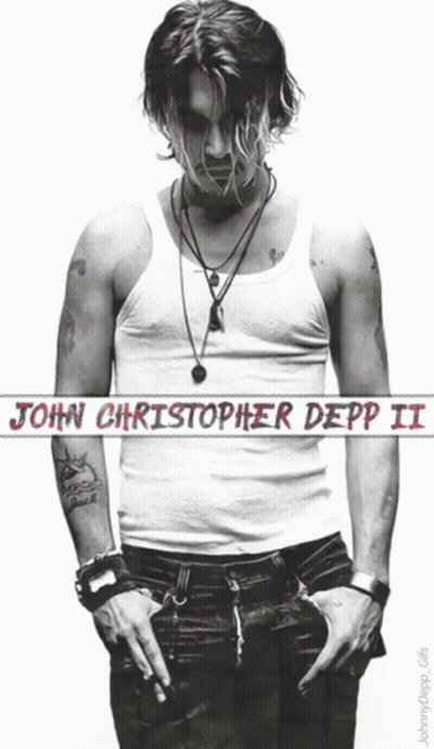 A Poster Of John Christopher Depp Ii With His Hands In His Pockets GIF