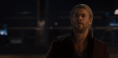 A Poster Of Thor With The Words You 'Re All Not Worthy GIF