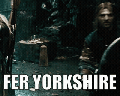 A Poster That Says Fer Yorkshire With A Man Standing In The Background GIF