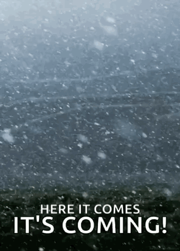 A Poster That Says Here It Comes It 'S Coming . GIF