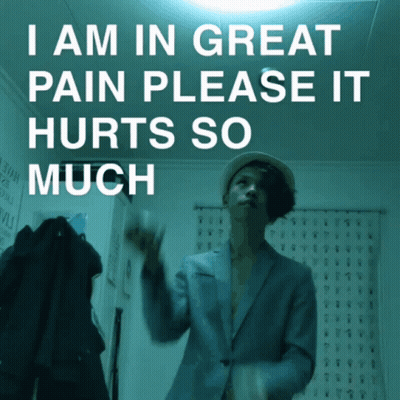 A Poster That Says I Am In Great Pain Please It Hurts So Much On It GIF