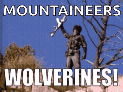 A Poster That Says Mountaineers Wolverines With A Man Holding A Rifle GIF