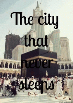 A Poster That Says The City That Never Sleeps With A Clock Tower In The Background GIF