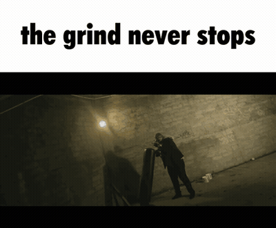 A Poster That Says The Grind Never Stops With A Man Standing In A Dark Room GIF