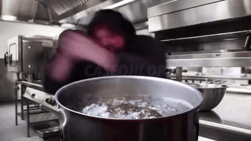 A Pot Of Boiling Water Is Being Stirred By A Person In A Kitchen That Says Caslohlor On The Bottom GIF