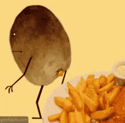 A Potato With Arms And Legs Is Standing Next To A Plate Of French Fries .. GIF