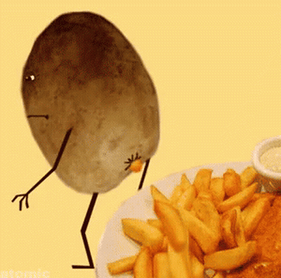 A Potato With Arms And Legs Is Standing Next To A Plate Of French Fries .. GIF