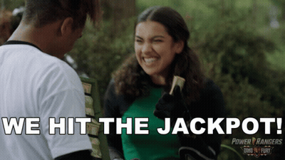 A Power Rangers Ad Shows A Girl In A Green Shirt GIF