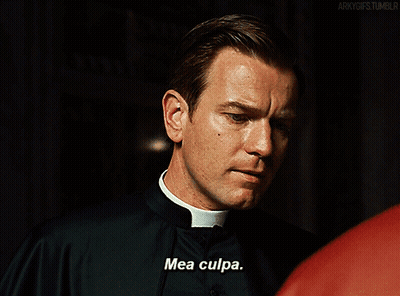 A Priest Says Mea Culpa In Front Of A Red Shirt GIF