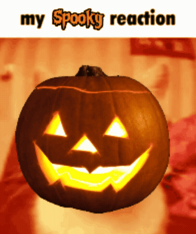 A Pumpkin With A Face Carved Into It And The Words " My Spooky Reaction " Below It GIF