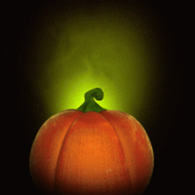 A Pumpkin With A Green Stem And A Yellow Light Behind It GIF