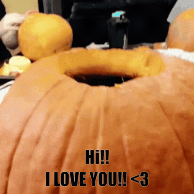 A Pumpkin With A Hole In It That Says Hi I Love You GIF