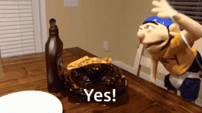 A Puppet Is Sitting At A Table With A Plate Of Food And A Bottle Of Ketchup And The Words Yes On The Table GIF